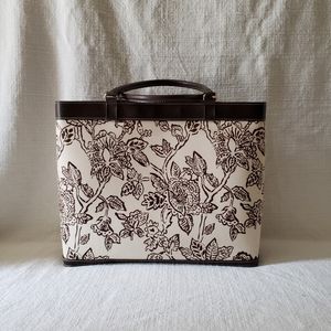 Estēe Lauder brown and cream floral hand bag